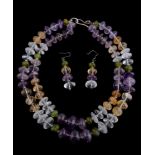 A two row amethyst, rock crystal, citrine and peridot bead necklace