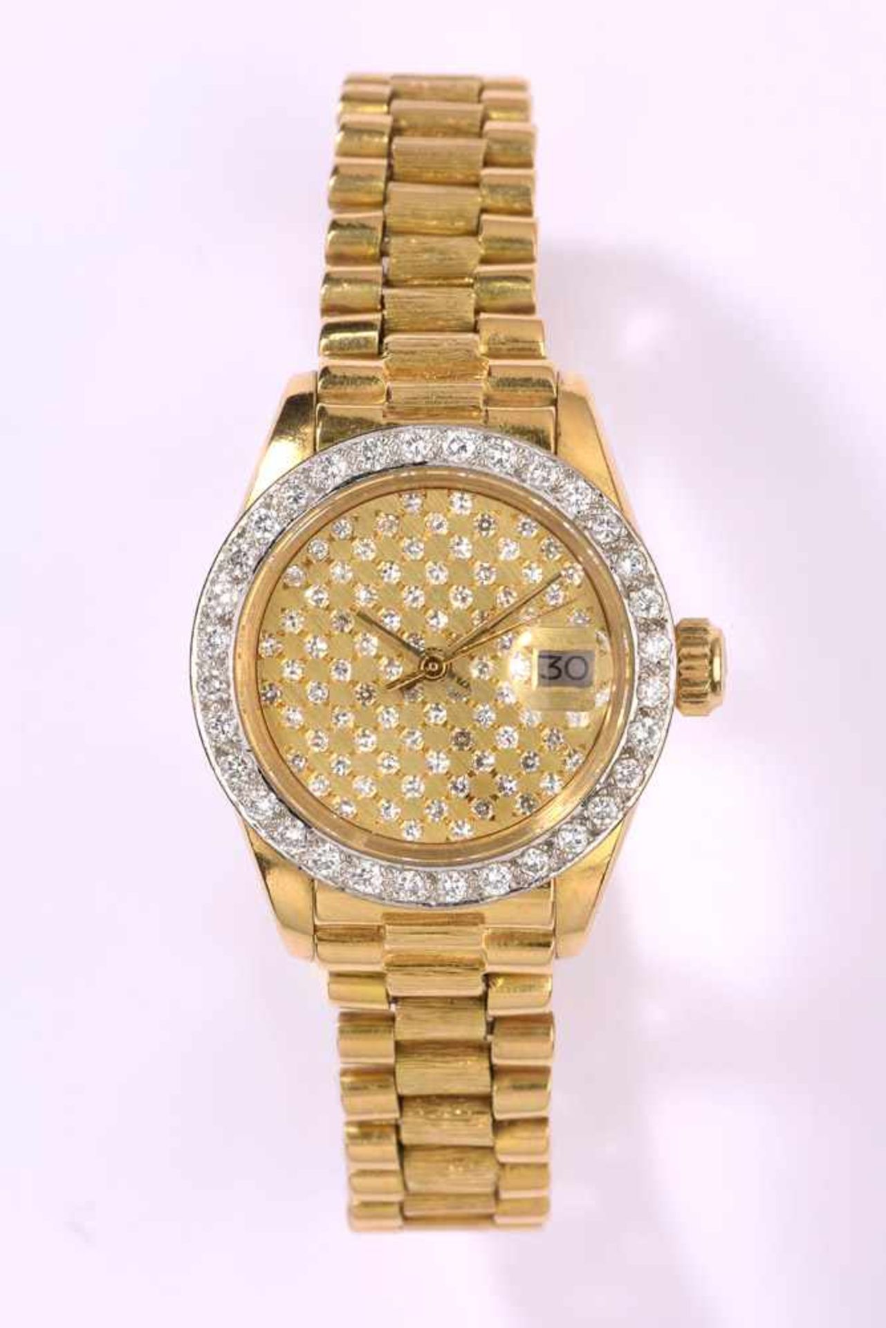 Damenarmbanduhr von Rolex, Oyster-Datejust750- Gelbgoldgehäuse und -armband. Brillantlunette und