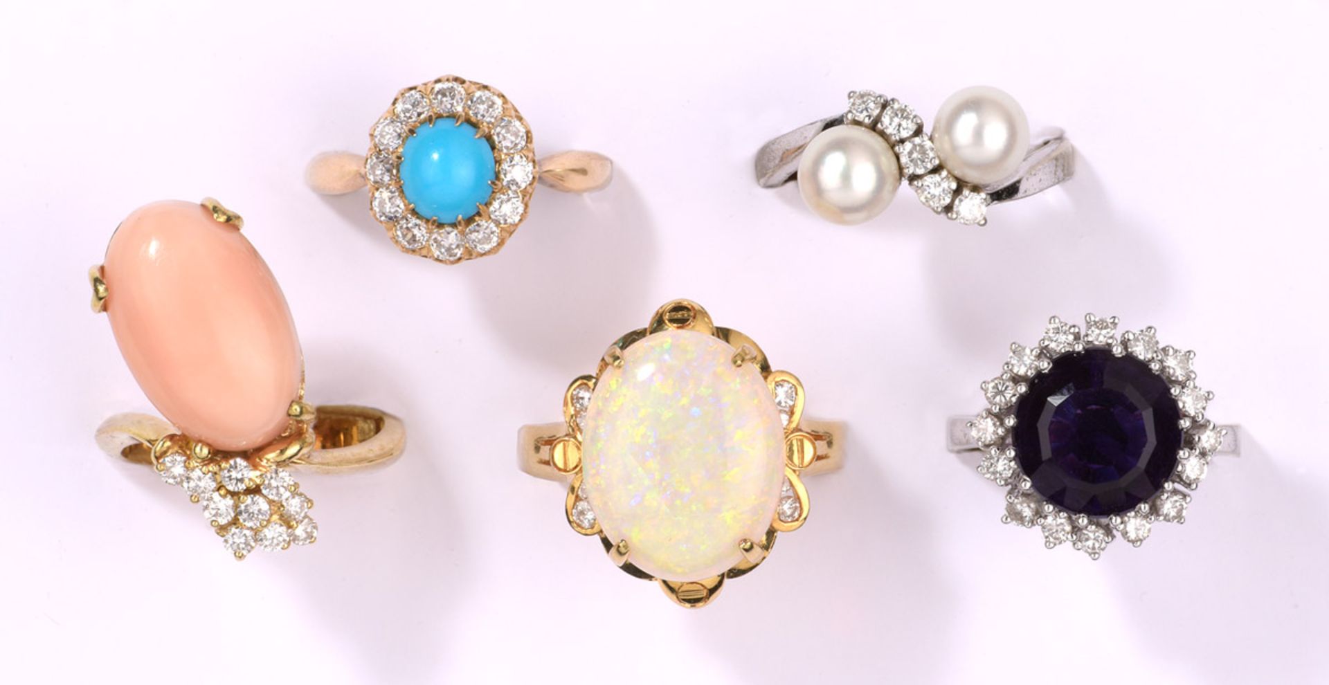 Fünf Ringe585- Gelb-/Weißgold, Brillanten, Perlen, Engelhautkoralle, Amethyst, Türkis und Opal.