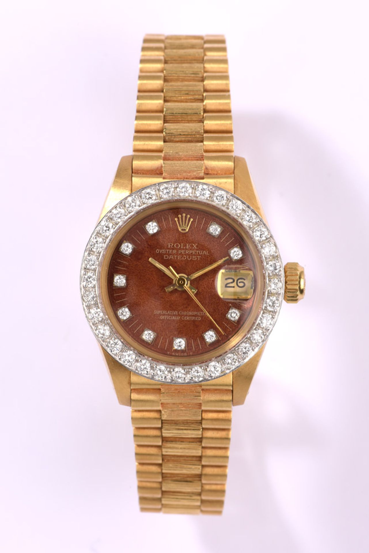 Damenarmbanduhr von Rolex, Oyster-Datejust750- Gelbgoldarmband und -gehäuse. Brillantlunette und