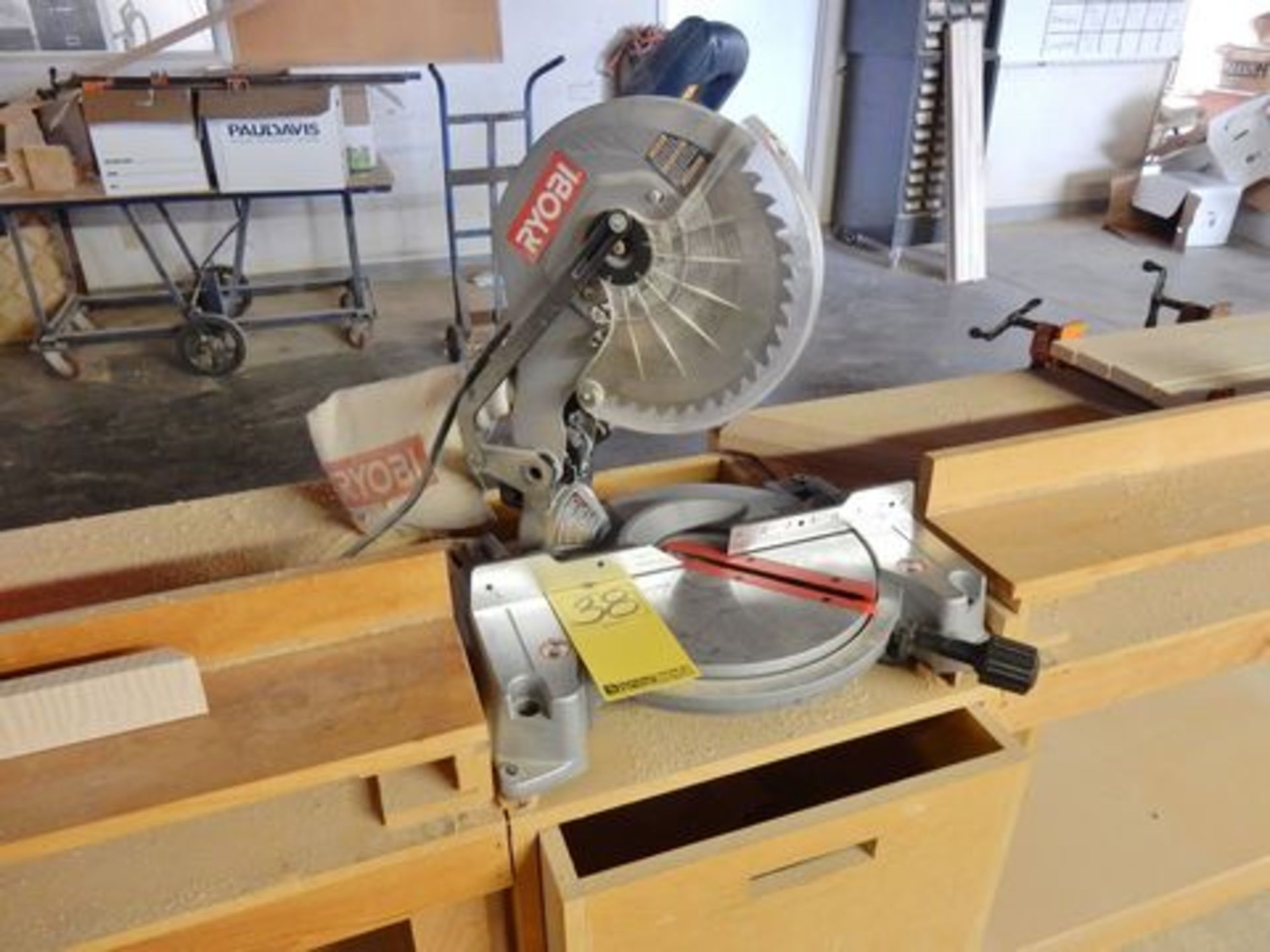 RYOBI 10" MITRE SAW, M# TS1344L, S/N GW140306116, 12' WOOD WORK TABLE