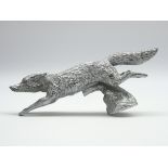 Cast metal car mascot in the form of a leaping fox,