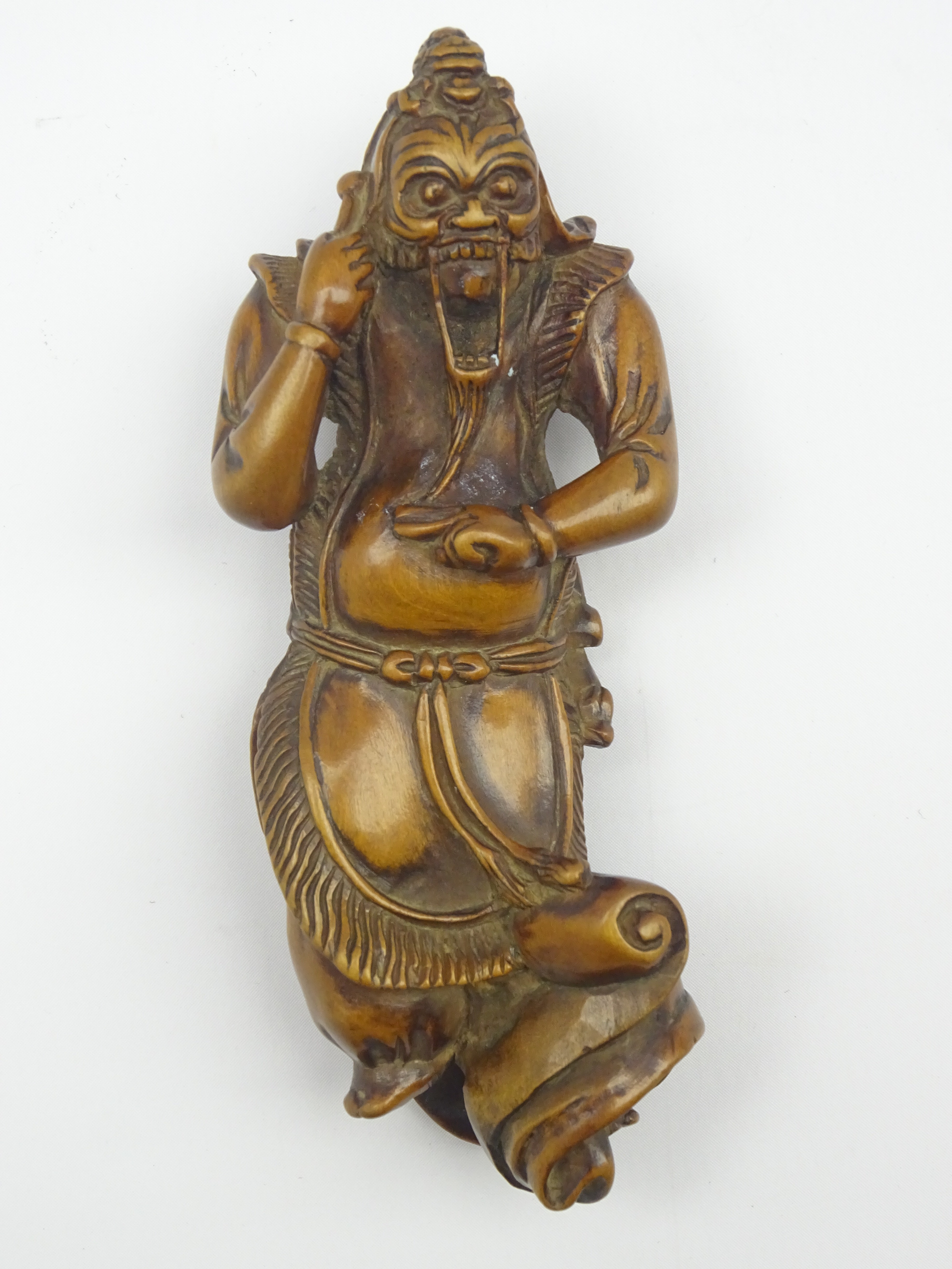 Japanese carved wood netsuke,