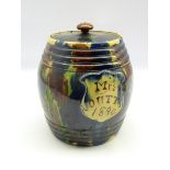 Late Victorian slip glazed barrel shaped jar and cover with cartouche inscribed Mrs Coutts 1890,