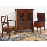 Edwardian walnut bookcase fitted with two lead glazed doors (W90cm, H109cm, D26cm),