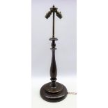 Early 20th century turned wooden table lamp with two branch brass fitting,