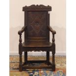 17th century elm and oak Wainscot armchair, lozenge carved panelled back, plank seat,