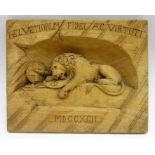 Souvenir wood carving of 'the Lion of Lucerne' as a monument to the Swiss Guards killed in 1792.