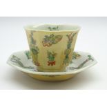 Chinese Kangxi famille verte tea bowl and saucer of panel sided design painted with vases and