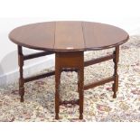 Small 20th century mahogany Sutherland table, oval drop leaf top, gate leg action base, H52cm,