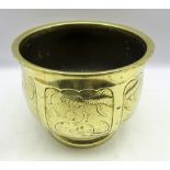 Eastern brass jardiniere, decorated with a dragon across six panels,