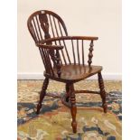 19th century yew wood low stick and pierced splat back Windsor armchair,