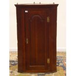 19th century oak wall hanging corner cupboard, single stepped arched panelled door,