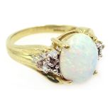 Opal and diamond gold ring,