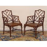 Pair Chinese Chippendale style simulated bamboo armchairs,