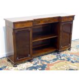 19th century rosewood sideboard, reverse break front fitted with three drawers,