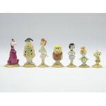 Complete set of seven John Beswick Flintstone figures; Wilma, Fred, Betty, Barney, Pebbles,