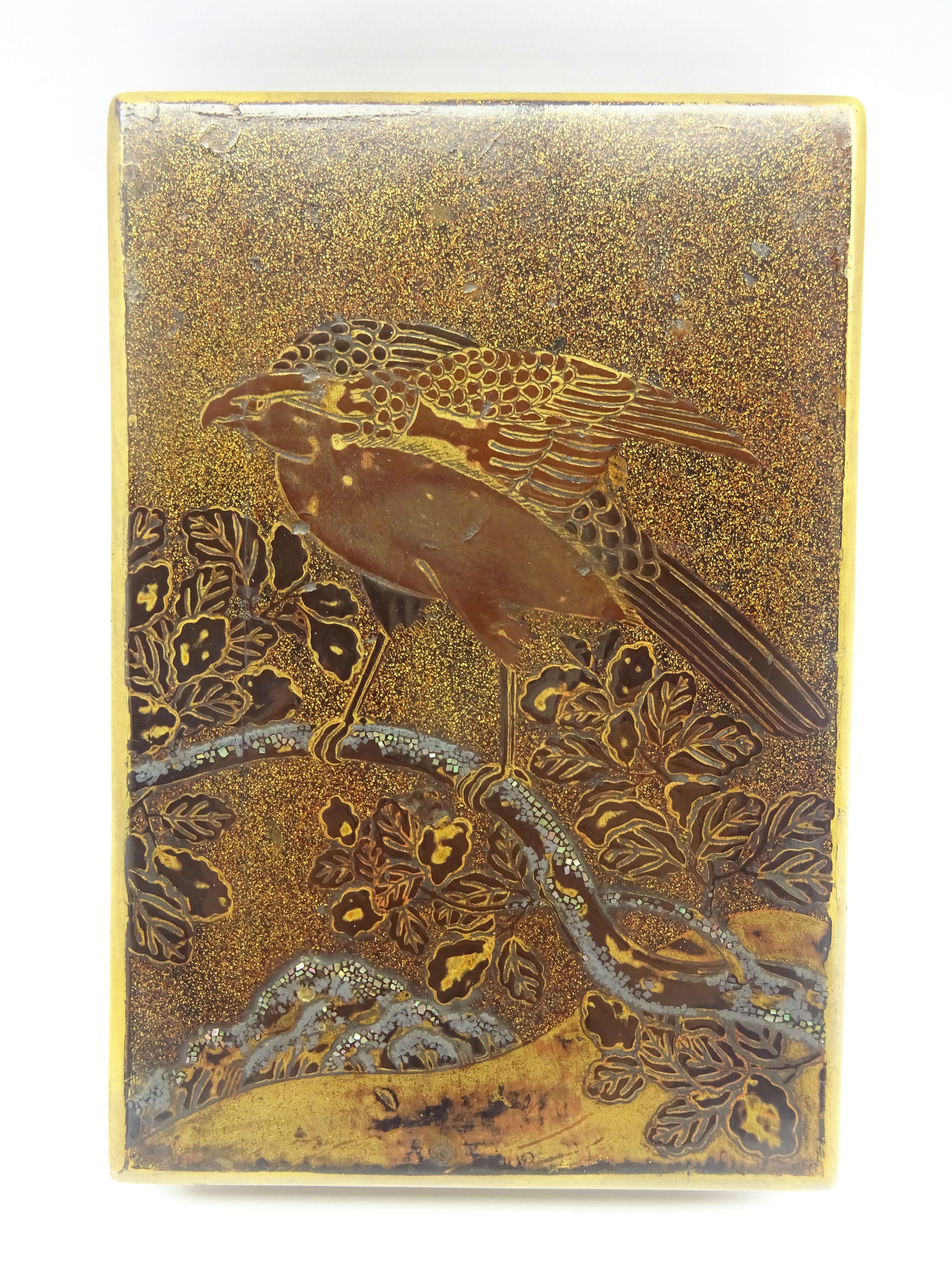 Another Japanese lacquer box, Edo period (18th Century) with a falcon on a flowering branch in gold,