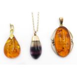 Gold oval amber pendant stamped 14K, gold amber pendant stamped 333,