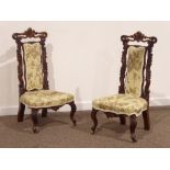 Pair Victorian scroll carved walnut nursing chairs,