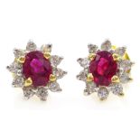 Pair of 18ct gold ruby and diamond cluster stud ear-rings,