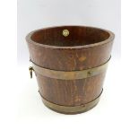 R A Lister & Co brass bound oak coal bucket with swing handle and tin liner,