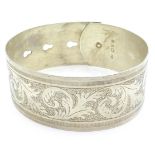 Silver buckle bangle by Charles Horner,