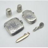 Miniature button hook in gold case marked '9ct' , 2 silver vesta cases,