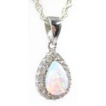 Opal and cubic zirconia silver pendant necklace,