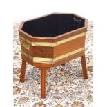 Georgian style mahogany and brass bound wine cooler, four splayed moulded supports, metal liner,
