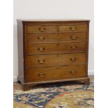 George III oak canted chest, two short and four long graduating drawers, bracket feet, W118cm,