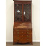 Early 19th century mahogany fall front bureau bookcase with shell inlay, four graduating drawers,