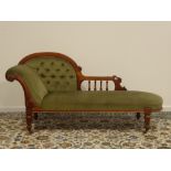 Late Victorian walnut chaise longue, curved and spindle back, upholstered in buttoned fabric,