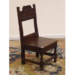 17th century country oak chair, carved back and planked seat,