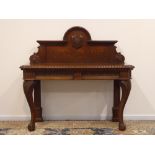 Late Victorian carved oak serving table, raised stepped arched back with centre crest 'C.