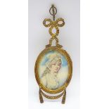 19th century miniature oval bust portrait of a young lady in a white dress, circle of Cosway,