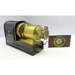 Late 19th Century black japanned metal and brass magic lantern with a mahogany mounted Rackwork