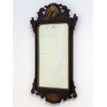 20th century mahogany Chippendale style mirror with carved gilt eagle pediment and inlaid shell