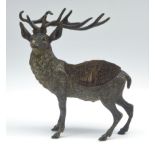 Bronze pen wipe in the form of a standing stag H16cms