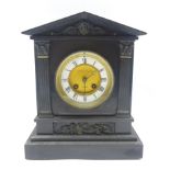 19th century black slate mantel clock, dial signed 'T. Martin & Co.