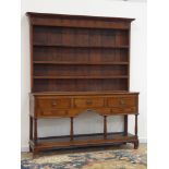 18th century oak dresser, three drawers above two small shallow drawers,