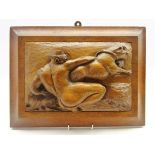 Allegorical carved oak plaque depicting a figure with panther,