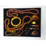 Amber bead necklaces, bracelet, silver mounted pendant,