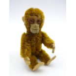 Small Schucco brown plush covered monkey the head removing to reveal a scent flask,