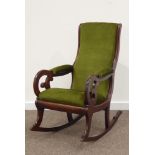 Victorian mahogany framed rocking chair upholstered in green,