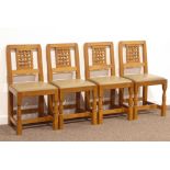 'Lizardman' set four oak dining chairs, carved lattice back, upholstered drop in seats,