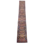 Persian blue ground runner rug, decorated with Herati motifs, geometric border,