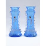 Victorian Mary Gregory blue glass vases of waisted form with clear glass frill sides,