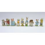 Nine Beswick Beatrix Potter figures; Mrs Tiggy Winkle, Sir Isaac Newton, Tom Kitten,