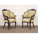 Pair Edwardian walnut drawing room chairs, pierced and carved cresting rail, shaped back and arms,